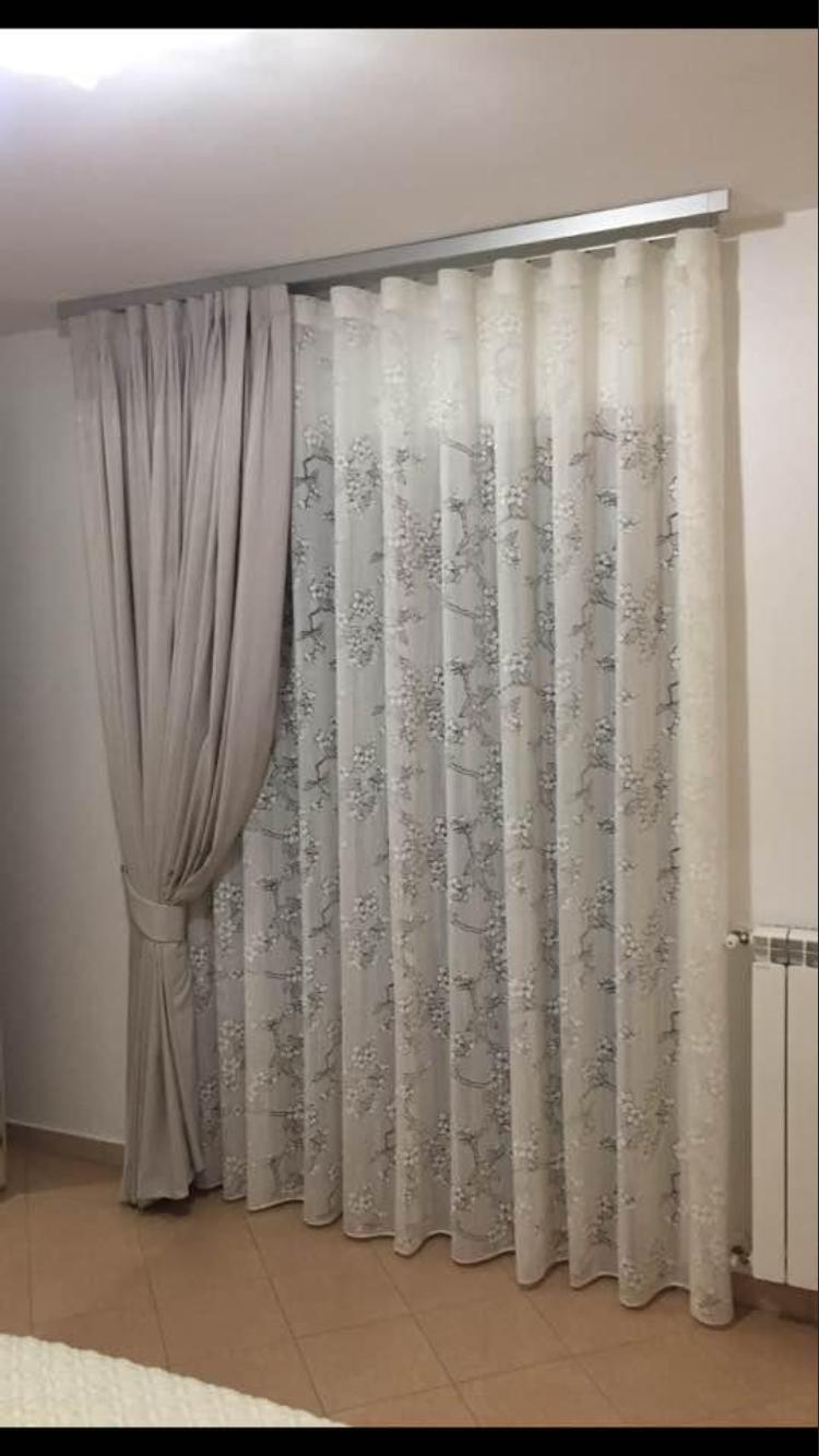Doppie tende in camera da letto